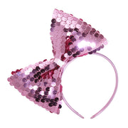 Op deze afbeelding zie je een Accessoires, van het merk Widmann. Hoofdband Met Paillettenstrik Roze