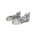 Riesige Glitzernde Silberturnschuh-Clown