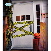 Op deze afbeelding zie je een Decoratie, van het merk Guirca. Afzetlint Halloween Danger Zombies 600 Centimeter
