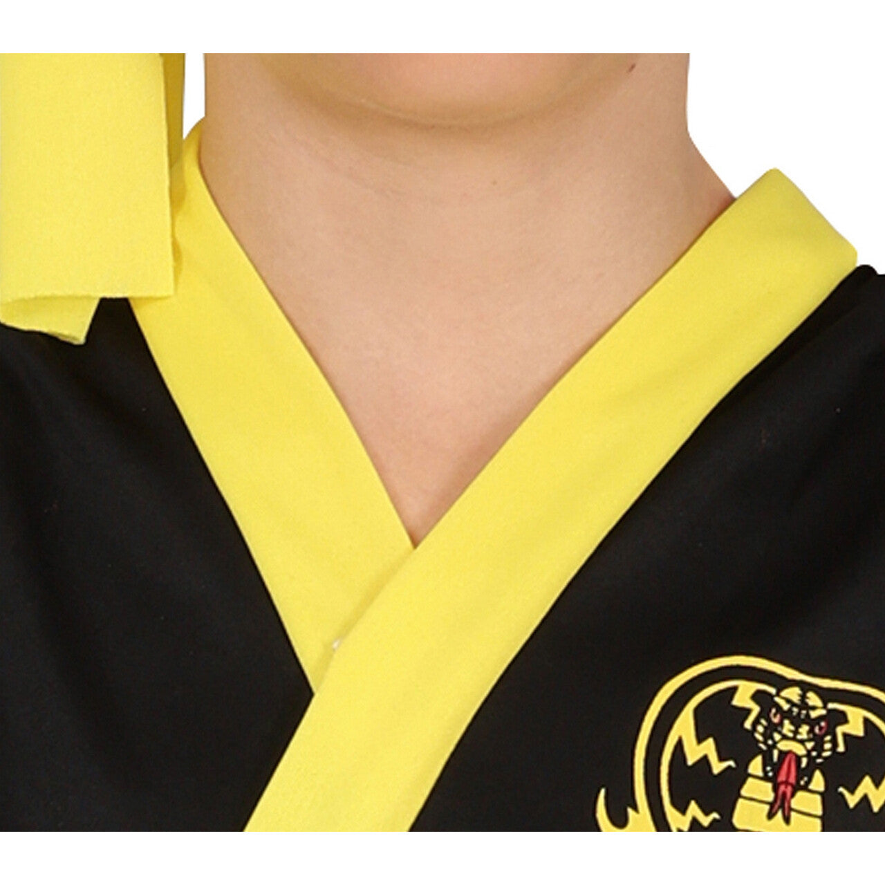 Op deze afbeelding zie je een Kostuums, van het merk Guirca. Cobra Karate Robbie Jongen Kostuum