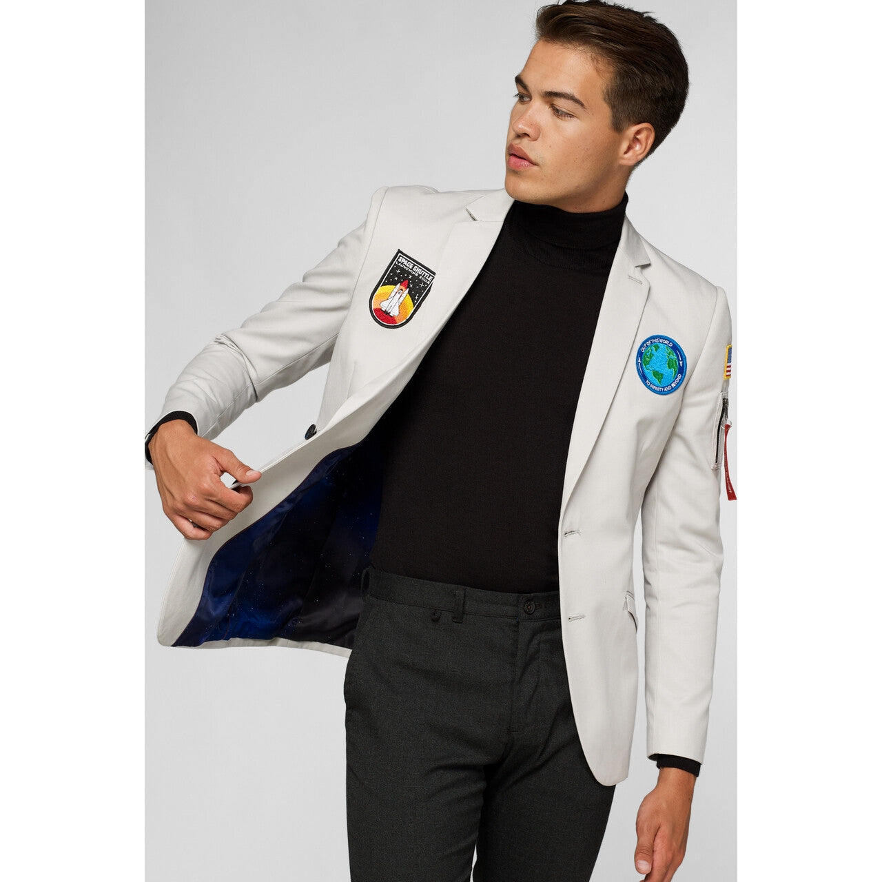 Op deze afbeelding zie je een Kostuums, van het merk Opposuits. Out Of This World Astronaut Jas Man