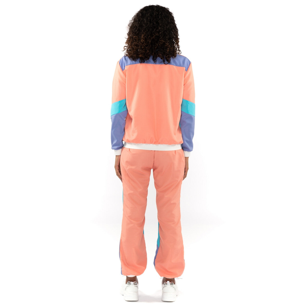 Op deze afbeelding zie je een Kostuums, van het merk Original Replicas. Fout 80s Trainingspak New Kids Jaren 80 Yannah Vrouw Kostuum