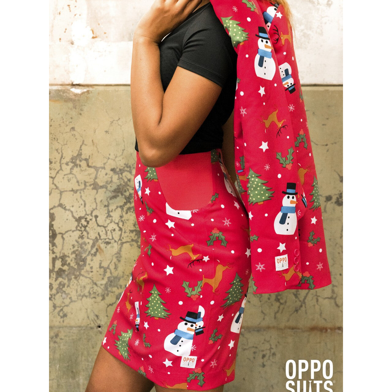 Op deze afbeelding zie je een Kostuums, van het merk Opposuits. December Christmiss Opposuit Vrouw Kostuum