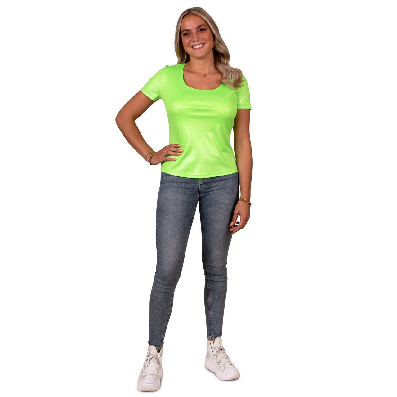 Op deze afbeelding zie je een Kostuums, van het merk PartyXplosion. Shirt Neon Groen Disco Vrouw