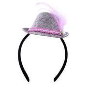 Op deze afbeelding zie je een Accessoires, van het merk PartyXplosion. Diadeem Tiroler Hoedje Roze