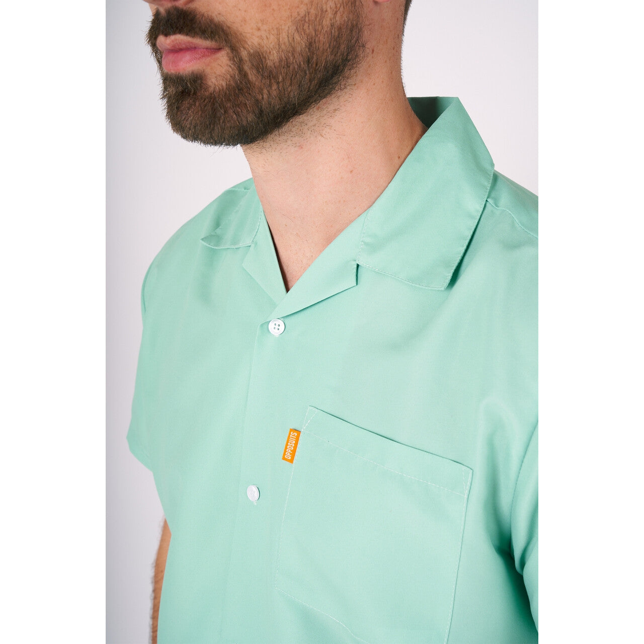 Op deze afbeelding zie je een Kostuums, van het merk Opposuits. Mega Magic Mint Man Kostuum