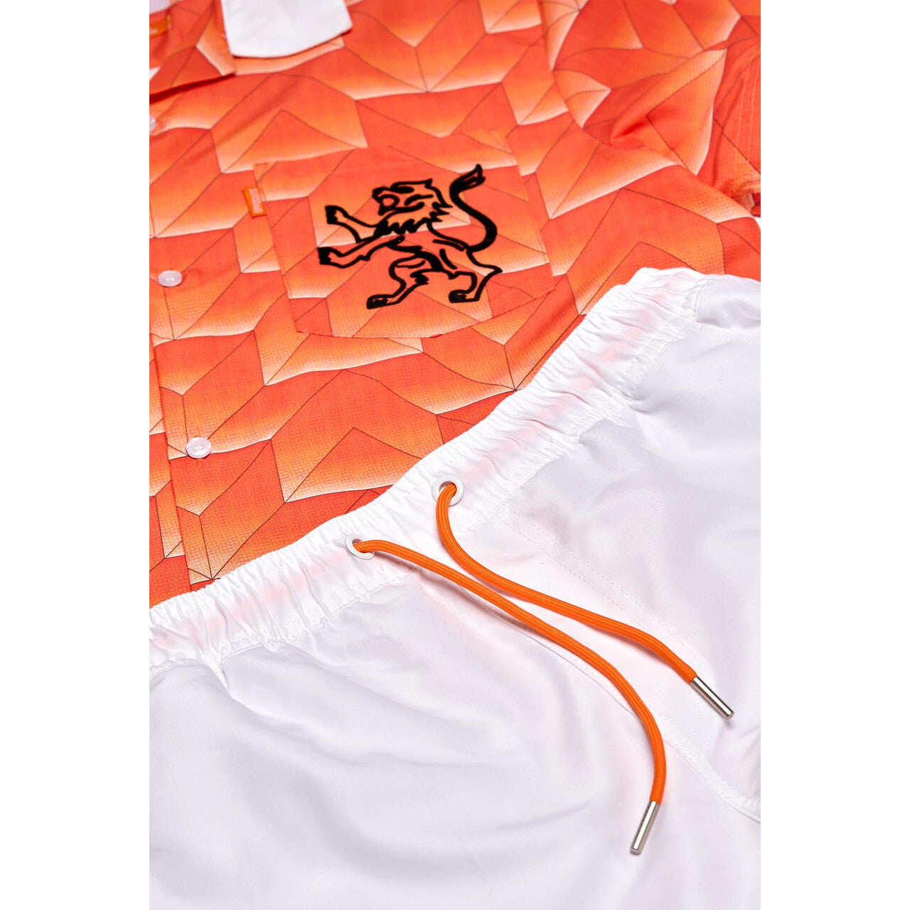 Op deze afbeelding zie je een Kostuums, van het merk Opposuits. Sportieve Orange Legend 1988 Man Kostuum